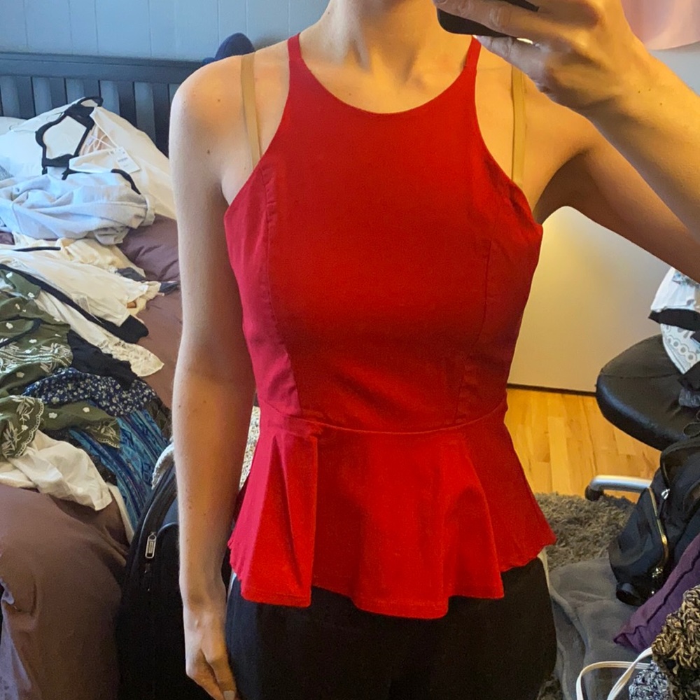 Red peplum top with open back